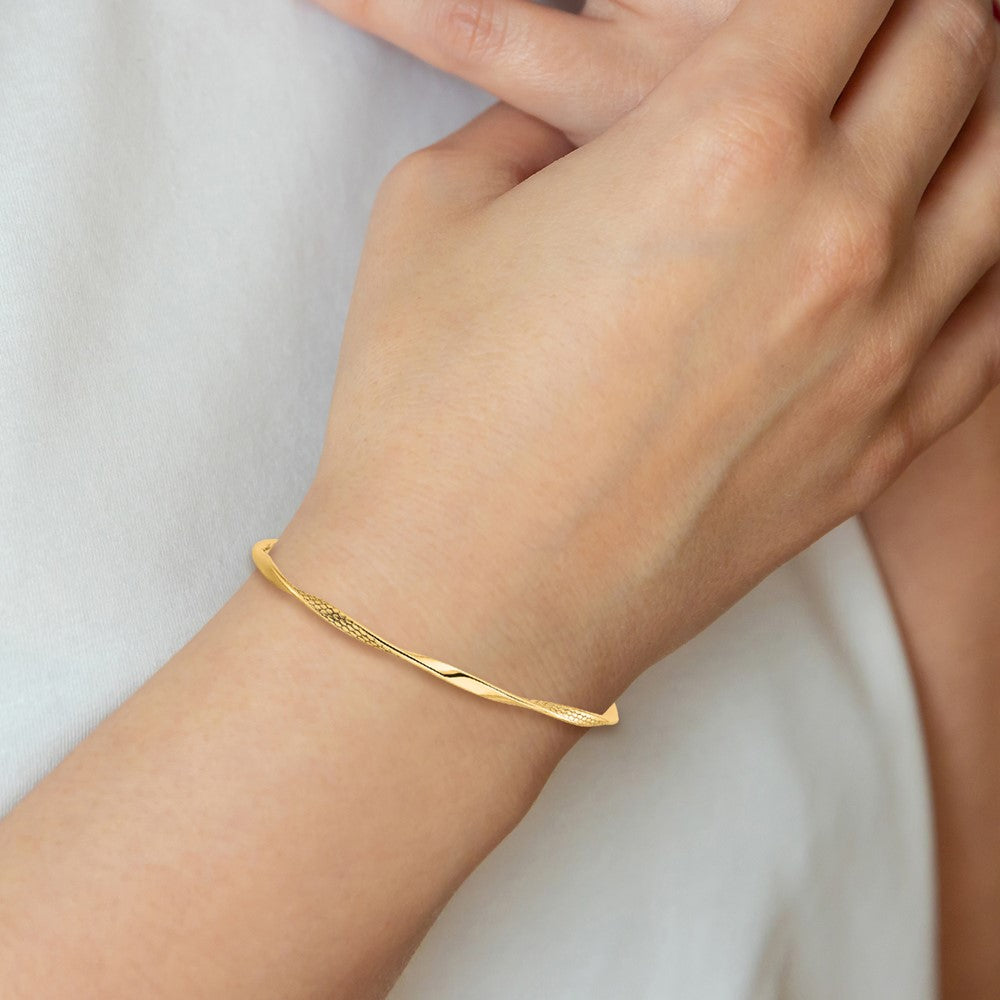 10K Polished Textured Twisted Slip-on Bangle